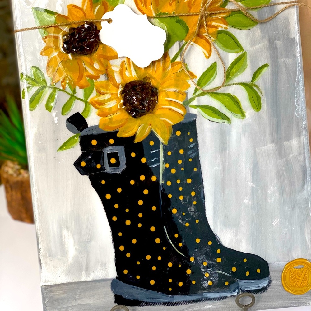 Rain boots and sunflower painting